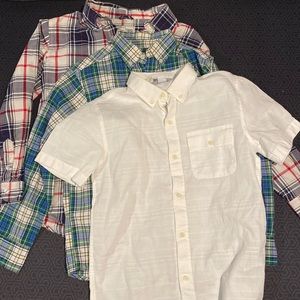 Lot of boys button down shirts. 2 plaid long sleeve, 1 white short sleeve, 10-12